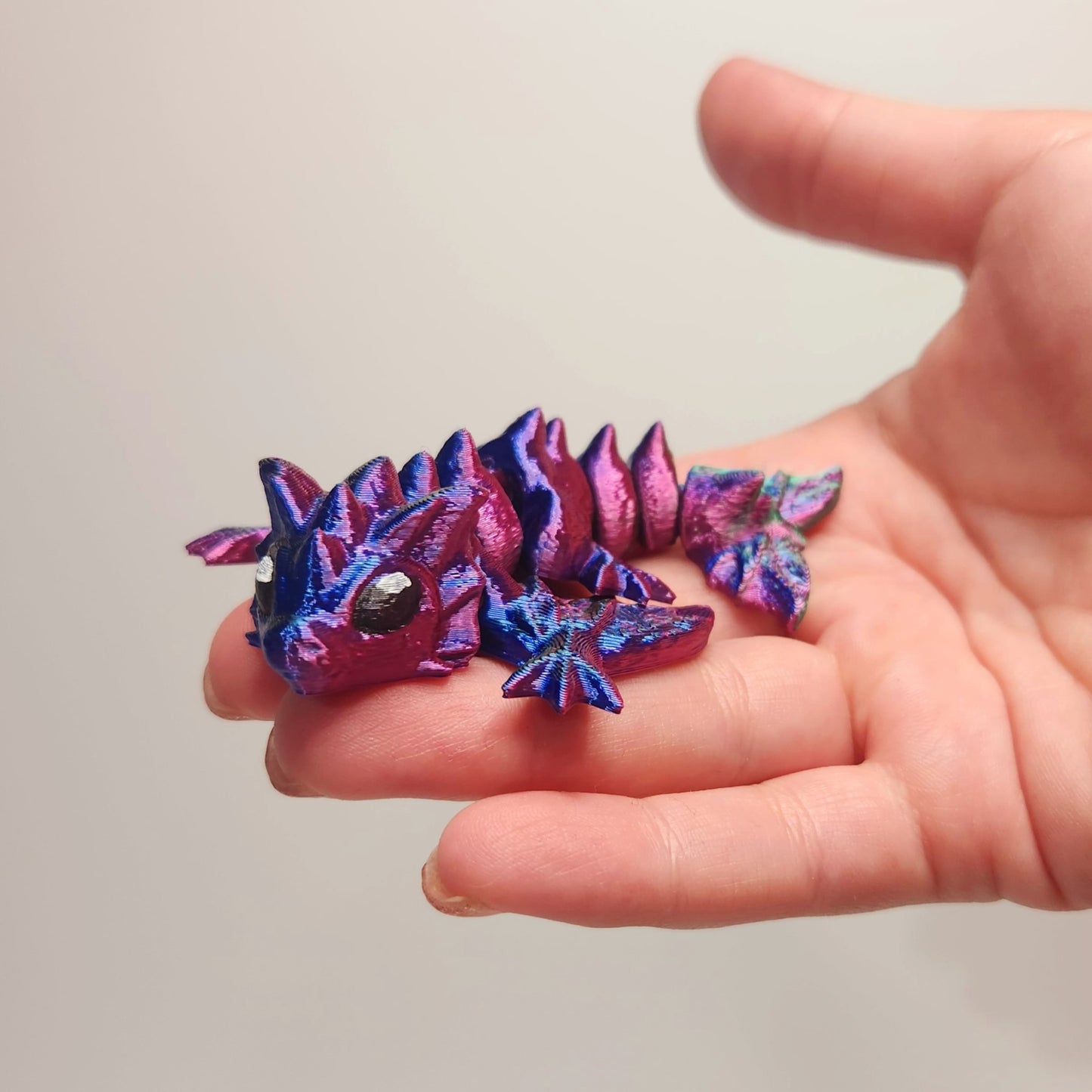 Tiny Wyvern in hand created by Hummingbird Trove