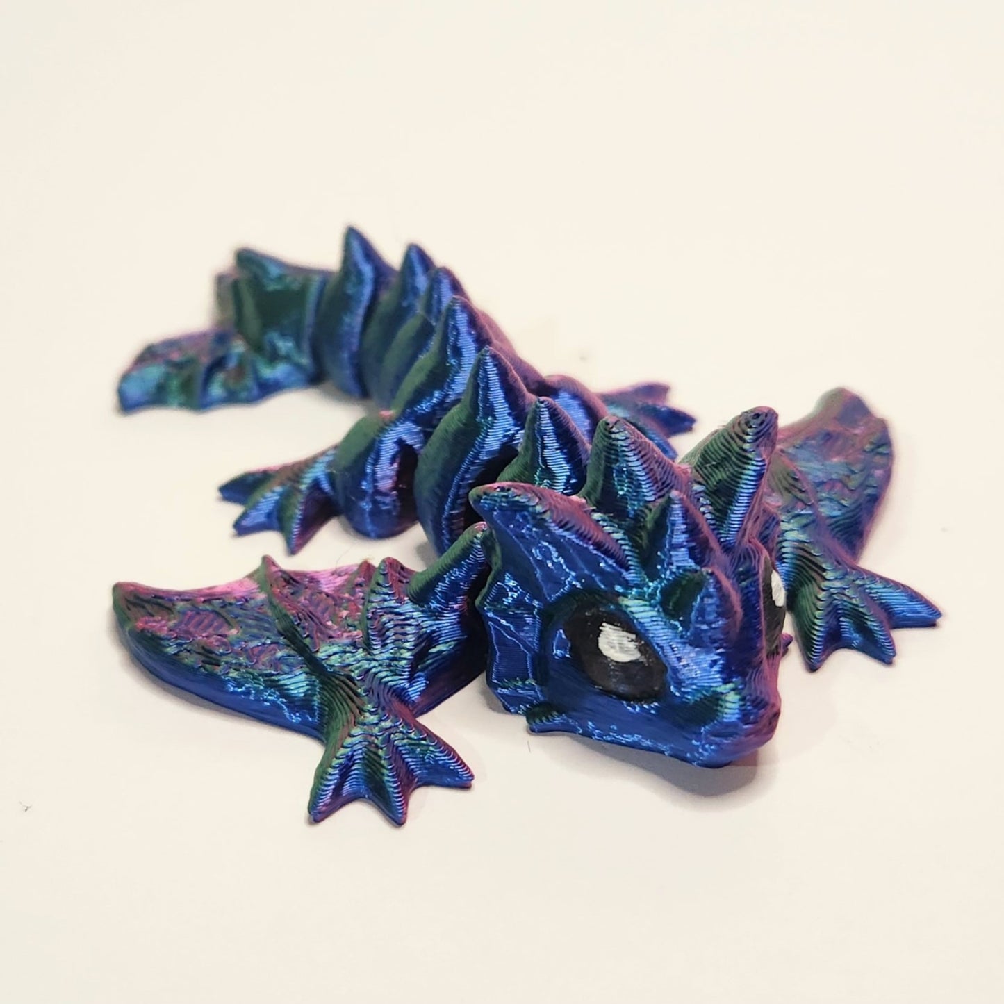 a single Tri Color tiny wyvern created by Hummingbird Trove